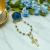 Broche Dezena Nossa Senhora Aparecida Dourado - Armazém Católico | Artigos Religiosos Católicos | Loja Católica