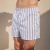 CAMISA BOXER. RISCAS CINZENTAS