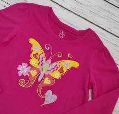 Remera importada mariposa en internet