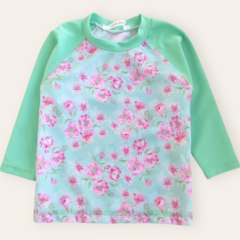 Remera UV50 FLORES aqua