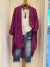 Conjunto incluye saco, remera y babucha