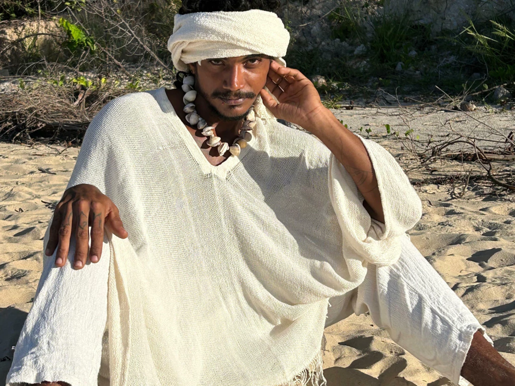 Poncho largo de hilo abierto
