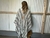 Poncho tropical largo - crudo y negro - comprar online