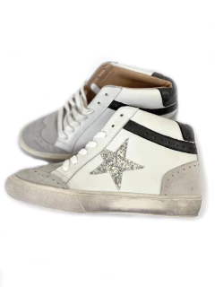 BOTITA en cuero blanco con estrella en glitter plata en internet