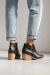 Botas madeira negro