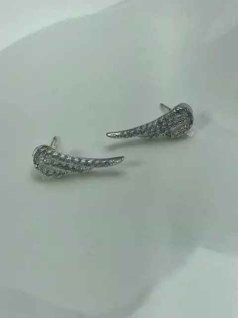 Brinco Asas Cravejadas