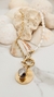 Collar Beach (acero + perla de rio) en internet