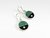 aros de plata geometricos color verde y negro con  incrustaciones de piedras