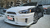 Imagem do Body Kit Lancer Completo - Parachoque Dianteiro e Traseiro, Paralamas, Capo Varis + Aerofólio e Saia Laterais Evolution - Sem Pintura