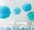 Pompones en papel seda azul claro. Paquete x 3 unidades 40 cm. - Ohlalá Celebraciones