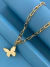 COLLAR MARIPOSA ORO - MAS NEGRO