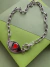 COLLAR OJO ROJO
