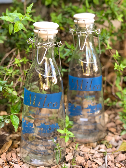 Botella de vidrio estampada