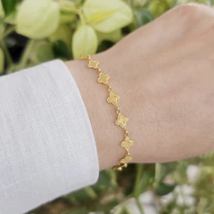 Pulseira Trevinhos Espelhados Banho Ouro 18K na internet