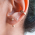 lollipop-topos-dorados-aretes-dobles-piercing-falso-medellin-bogota