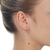 Brinco Argolinha Fechada com Pingente De Zirconias Folheado A Ouro 18k - comprar online