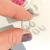 Brinco Argolinha Oval de Zirconias Folheado A Ródio Branco - Drusi | Loja de Semijoias - Coleções de Colares Femininos, Brincos