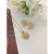 Conjunto Colar E Brincos Flor Repleto de Zirconias Folheado A Ouro 18k na internet