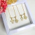 Colar Canga Zirconias Com Menino e Patinha Pet Folheada A Ouro 18k - Drusi | Loja de Semijoias - Coleções de Colares Femininos, Brincos