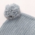 CAPELINA POMPON GRIS - Mini Ánima Bebés