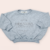 BUZO OVERSIZE FRISA GRIS MELANGE
