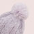 GORRO POMPON TEJIDO LILA en internet