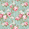 Tela gabardina estampada con flores rosas y blancas sobre fondo malva