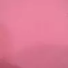 Tejido interlock de color rosa chicle, suave y uniforme.