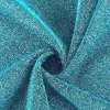 Tela Lurex turquesa con brillo, ideal para indumentaria y manualidades.