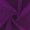 Tela Lurex de color violeta con brillo, ideal para confeccionar indumentaria y manualidades.