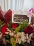 Buquê de 06 Rosas e Plaquinha Te Amo Cacau Show na internet