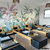 Mural de vinilo con un diseño botánico en un estudio de pilates, mostrando plantas tropicales y equipamiento de ejercicio.