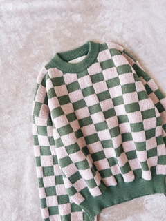 Sweater cuadritos verde y rosa en internet