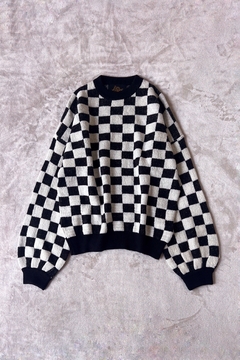 Sweater cuadritos negro y crudo