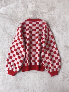 Sweater cuadritos rosa y rojo en internet