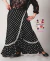 Falda flamenca Envolvente Cruzada de Seda Negra Lunares Blancos y Puntilla Broderie
