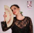 Image of Black lace blouse with 3/4 elastic balloon sleeves and a loose fit