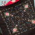 Image of Machine embroidered Jersey manton Manton Español Medium Black flowers Multicolor