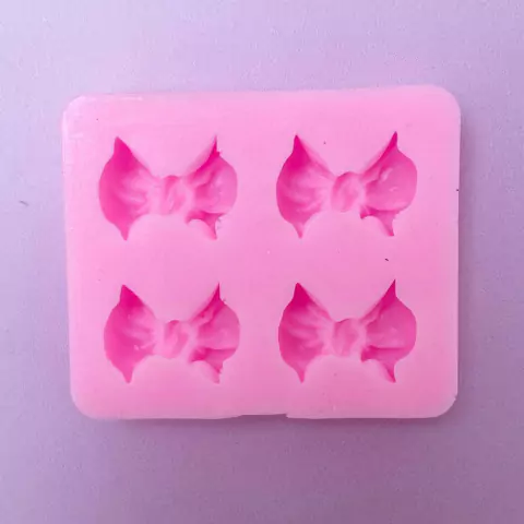 MOLDE DE SILICONA MOÑO PUNTA X 4