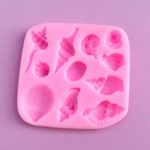 MOLDE DE SILICONA CARACOLES X 11
