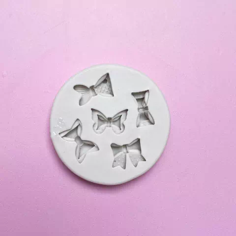 MOLDE DE SILICONA MOÑOS X 4 Y COLA DE SIRENA