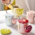 Taza corazón iridiscente con tapa y cucharita - tienda online