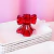 Candelabro portavela Moño rojo