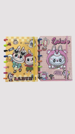 CUADERNO A5 PERSONAJES CON ANILLOS DE COLORES en internet