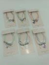 SET DE 2 PULSERAS CON DIJE - comprar online