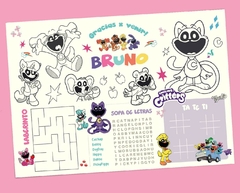 Colorful activity placemat for children featuring cartoon characters, games, and personalized name section.