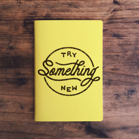 cuaderno try something new amarillo