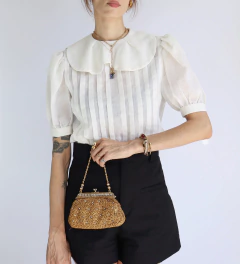 Bolsa Toillete Anos 60 na internet