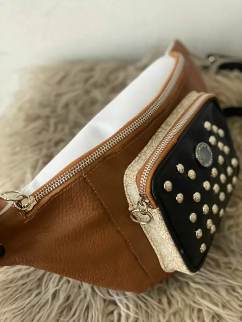 Riñonera Kale Kraque con blanco y suela