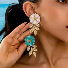 A101150 Flor Resina Marfil con pétalos oro - TINA ALLÓ - MARROQUINERÍA Y CALZADO FEMENINO